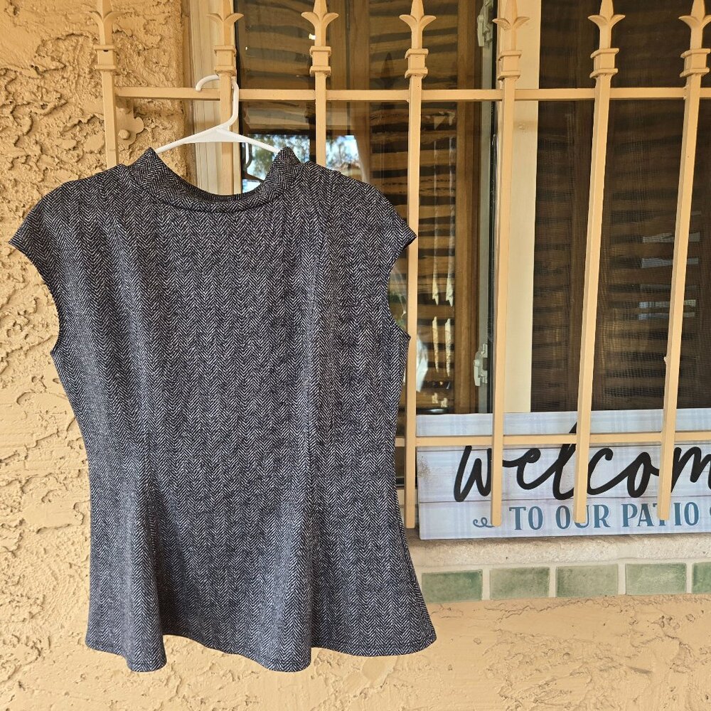 NWOT Peplum Black and white tank top